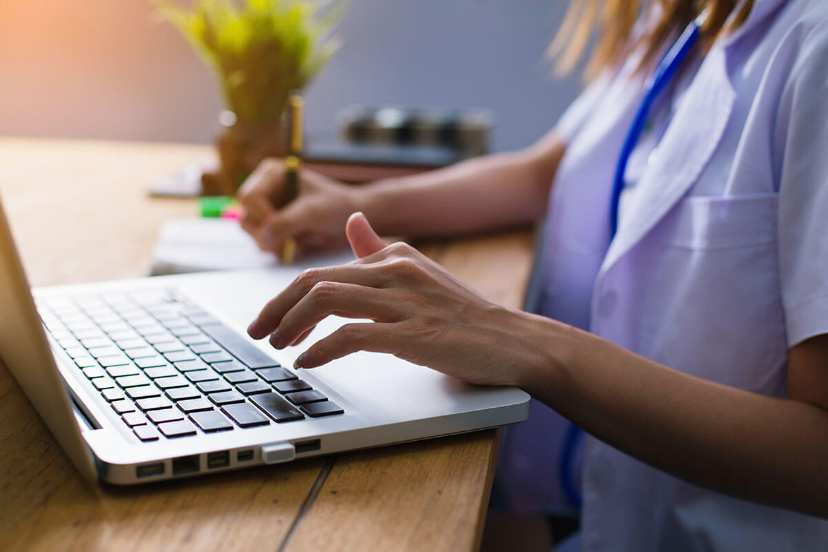 An image of a pharmacist reviewing a patient